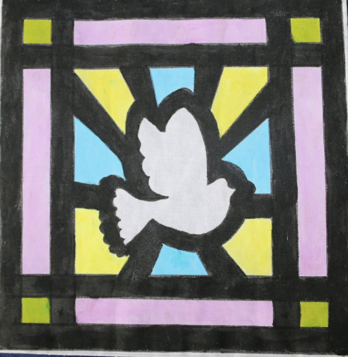 Image of a dove in stained glass window