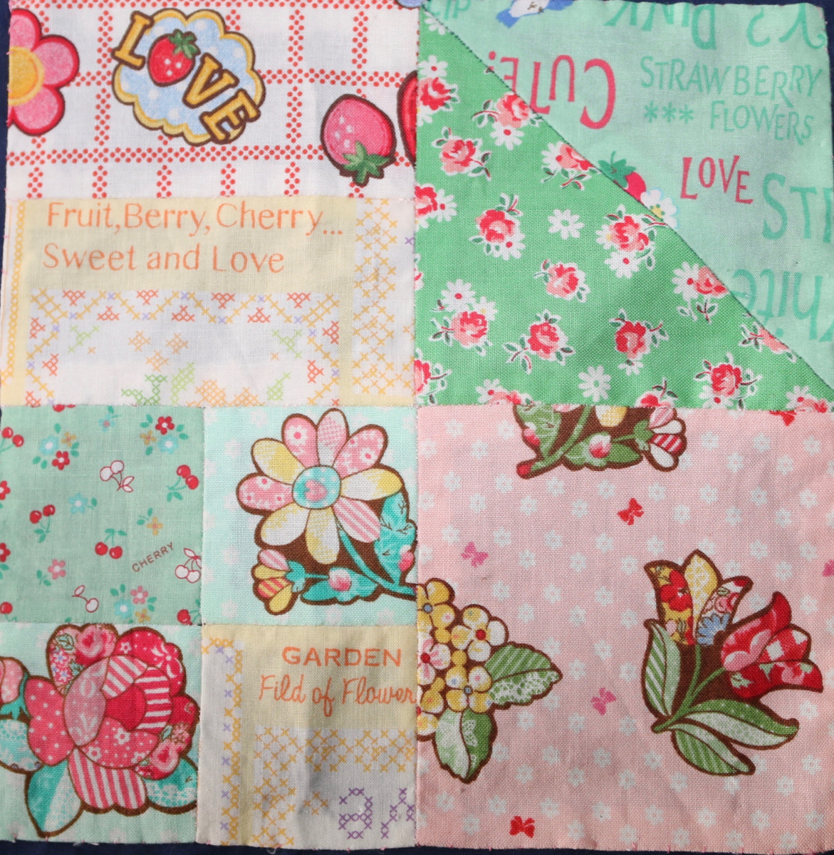 Patchwork square with floral material