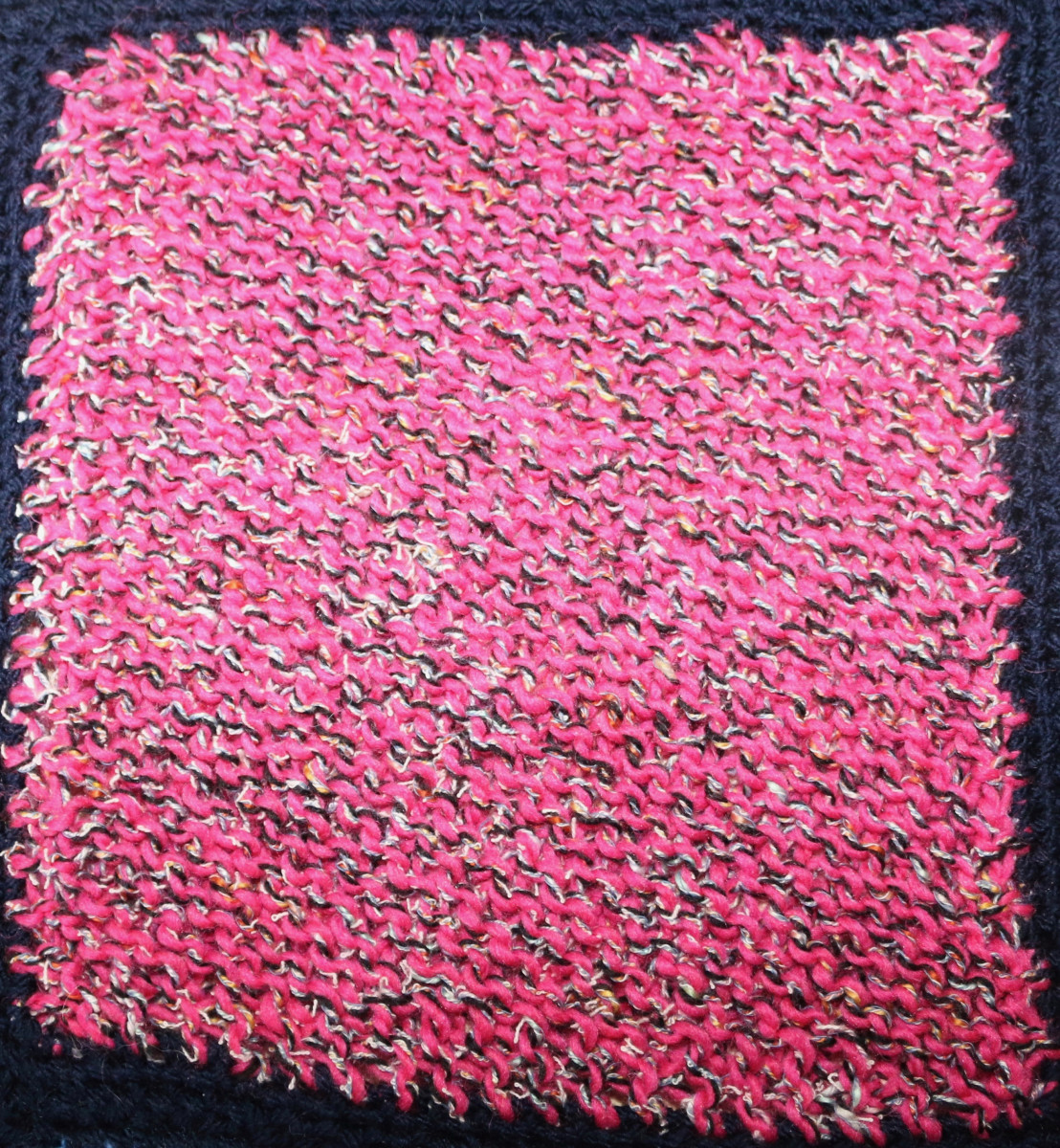Pink knitted square