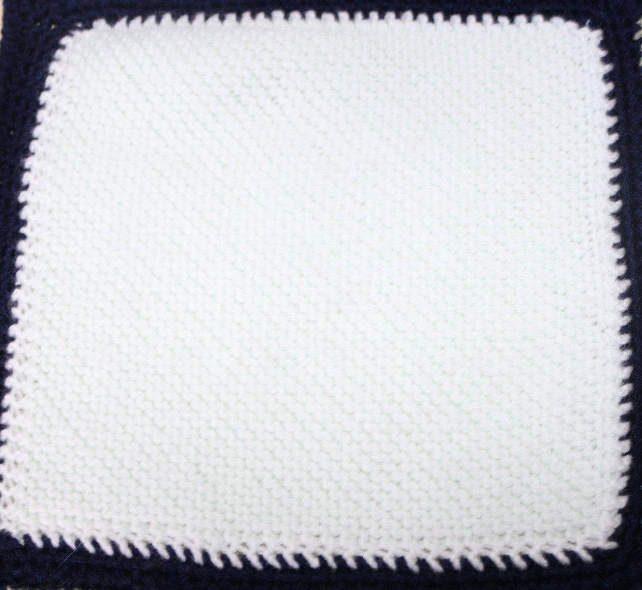 White knitted square