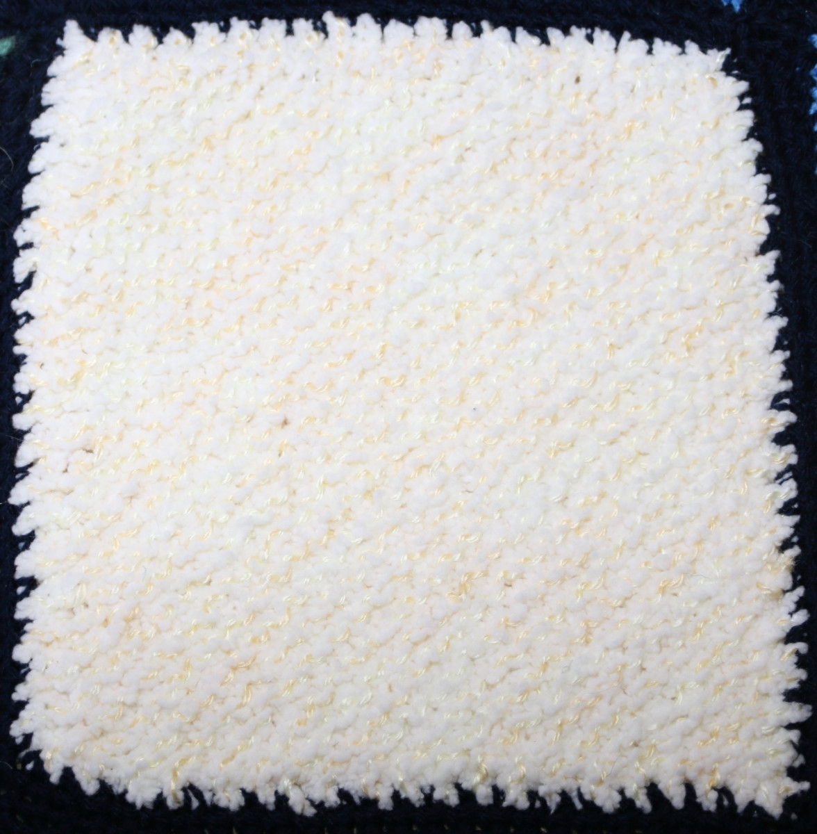 Cream knitted square