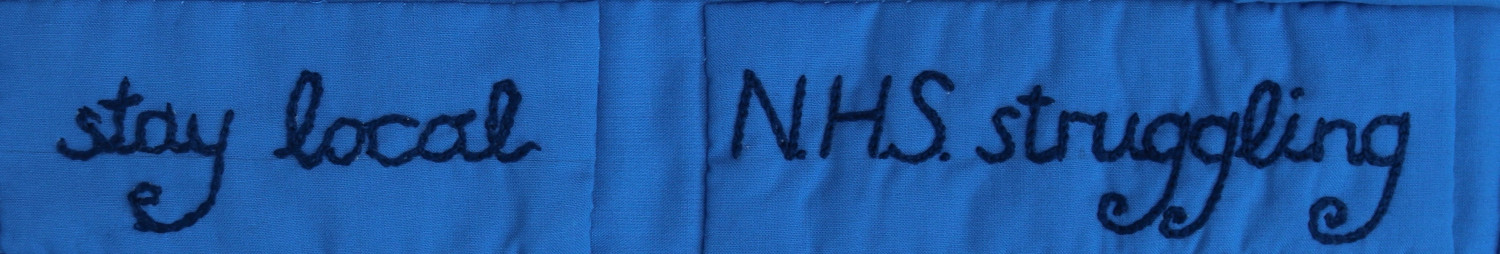Embroidered words: stay local, NHS struggling